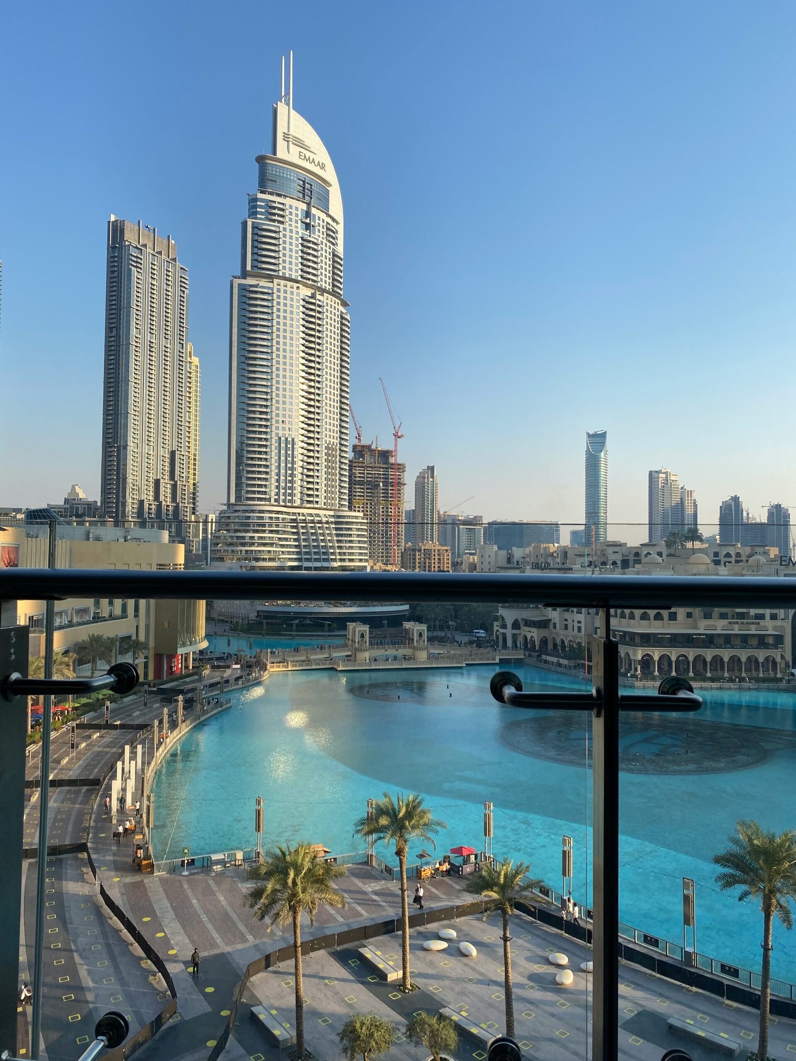 Dubai investment income – view of Downtown Dubai’s Dubai Fountain lake and surrounding Emaar high-rises, illustrating rental demand and investor returns.